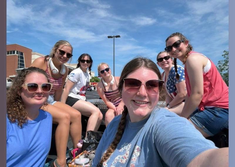 Carousel Slide 8: The Team at the London Fourth of July Parade! We had so much fun!
